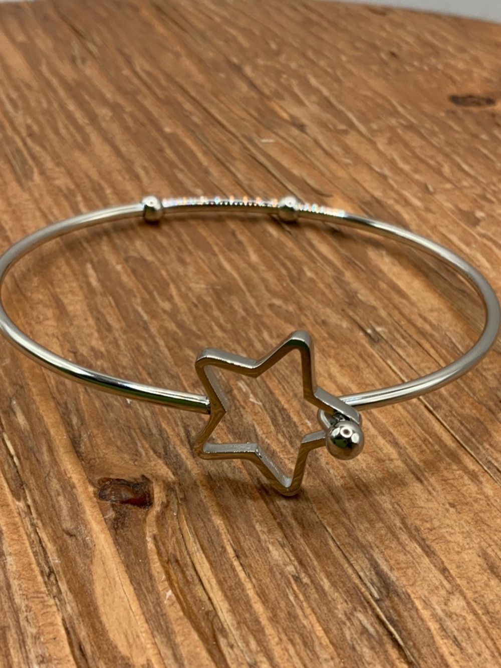 Plunder Design Silver Tone Star Bangle Bracelet